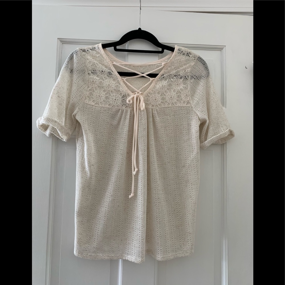 Adorable Oatmeal Top with Lace Details.